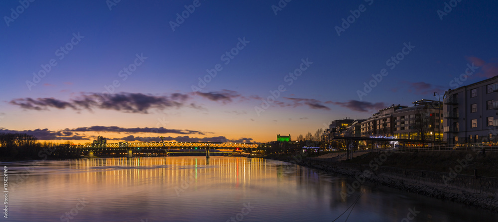 View from harbour at sunset, Bratislava castle, business buildin View from harbour at sunset, Bratislava castle, business buildin