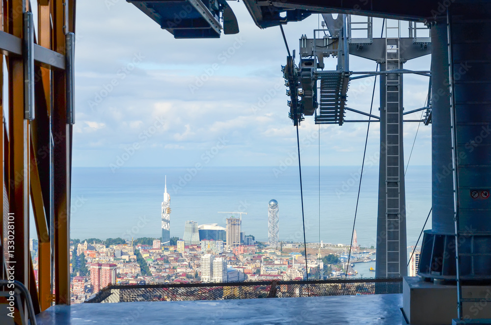 Flew on a scenic cable car seen Batumi aerial view.