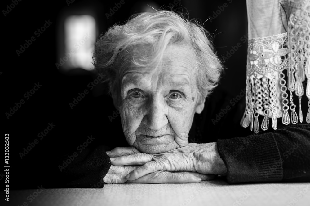 Grandma. Closeup black and white portrait of an elderly woman