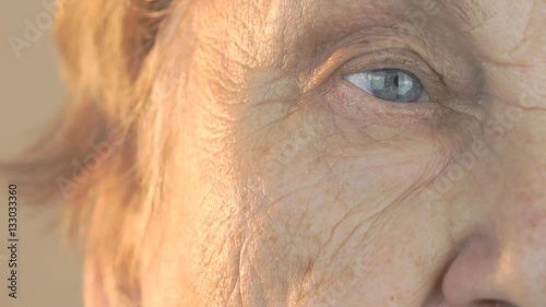 Woman's face with disturbing look of face. Close up photo