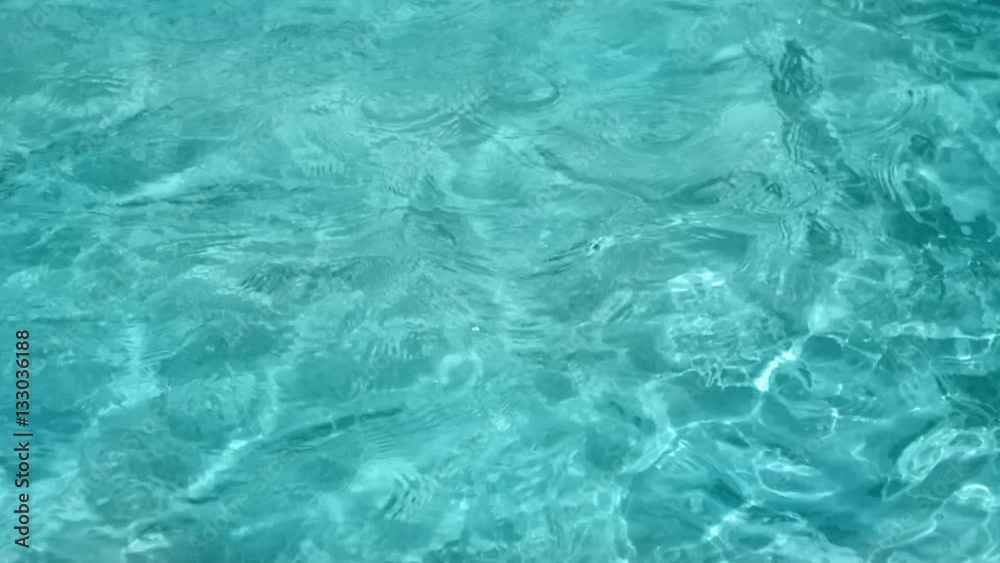SLOW MOTION: Tropical sea details, blue water in daylight SLOW MOTION: Tropical sea details, blue water in daylight
