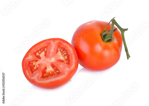 whole and half cut fresh tomato on white background