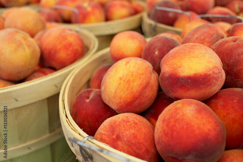 Bushel Baskets of Fresh Peaches