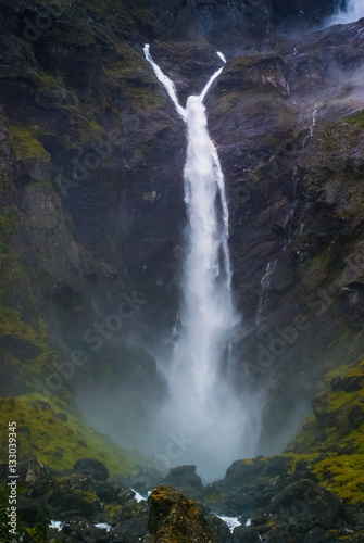 Landscape with views of the largest waterfall in the clouds. The county of More og Romsdal. Norway