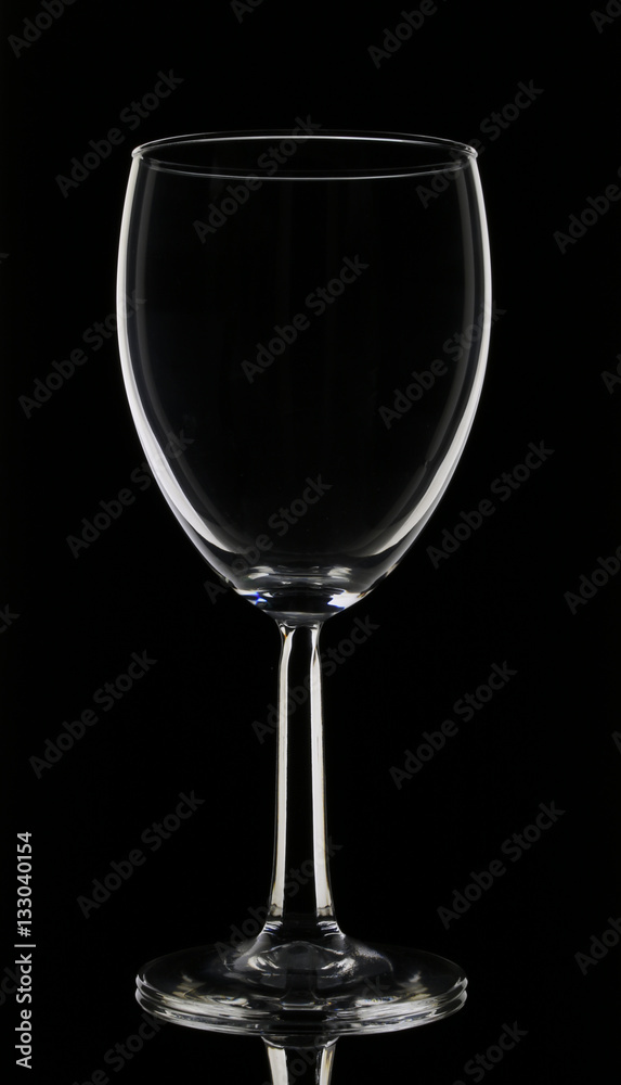 Elegant tall wine glass isolated on black background 
