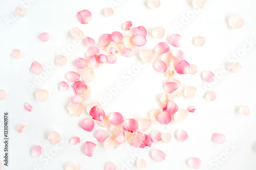 Fototapeta Naklejka Na Ścianę i Meble -  Frame made of pink roses petals on white background. Flat lay, top view. Valentine's background