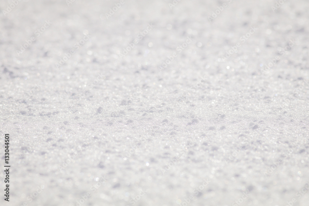 Obraz premium Freshly fallen snow creates a soft and pure surface pattern for background