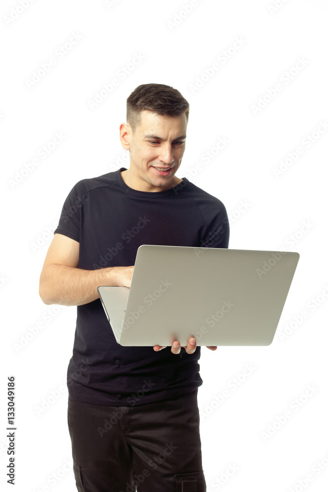 Portrait of smiling young man with laptop isolated Portrait of smiling young man with laptop isolated