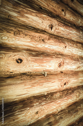 The old log wood walls closeup.