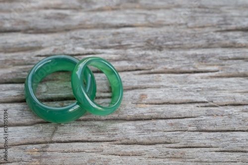 Jade ring on wooden, Concept of love.