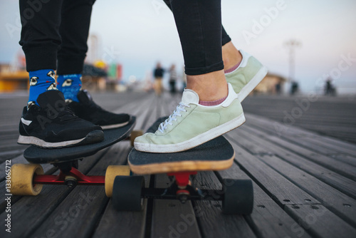 Romantic longboard ride on the boardwalk