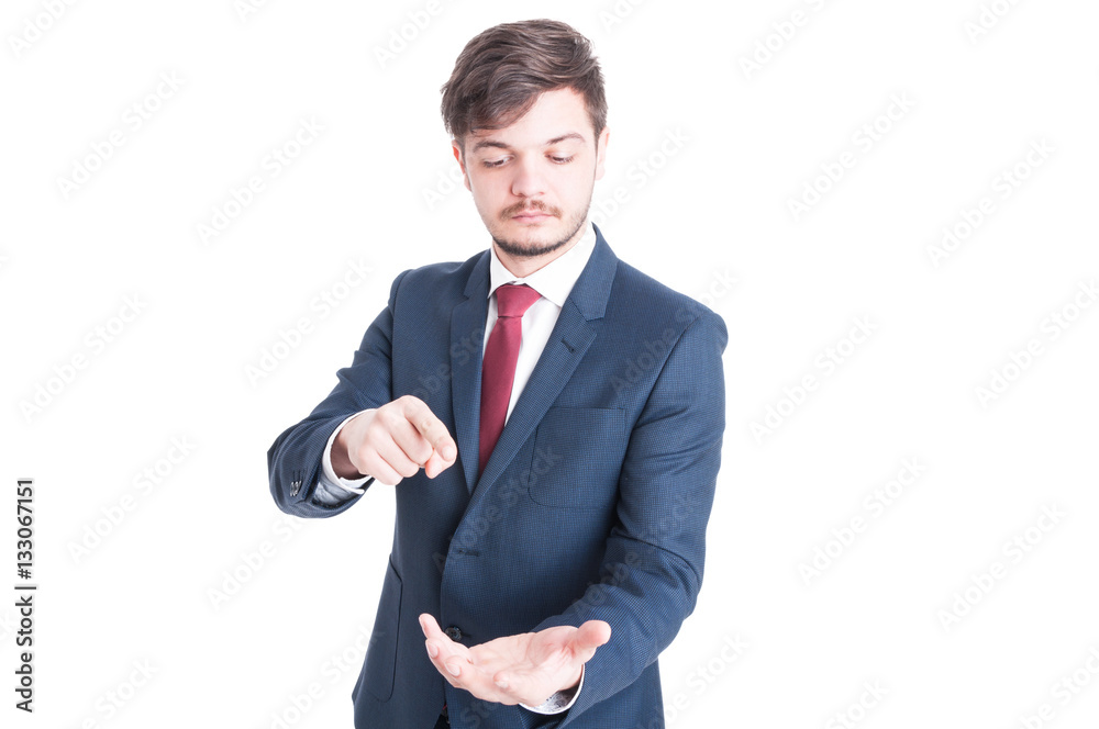 Business man standing holding and pointing something Business man standing holding and pointing something