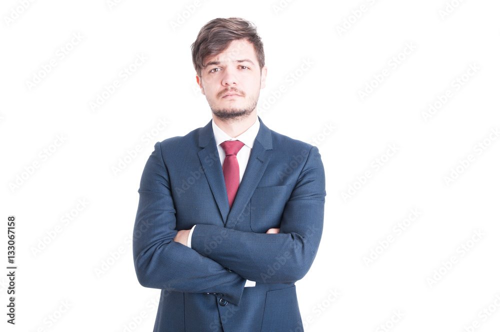 Business man looking sad posing with arms crossed Business man looking sad posing with arms crossed