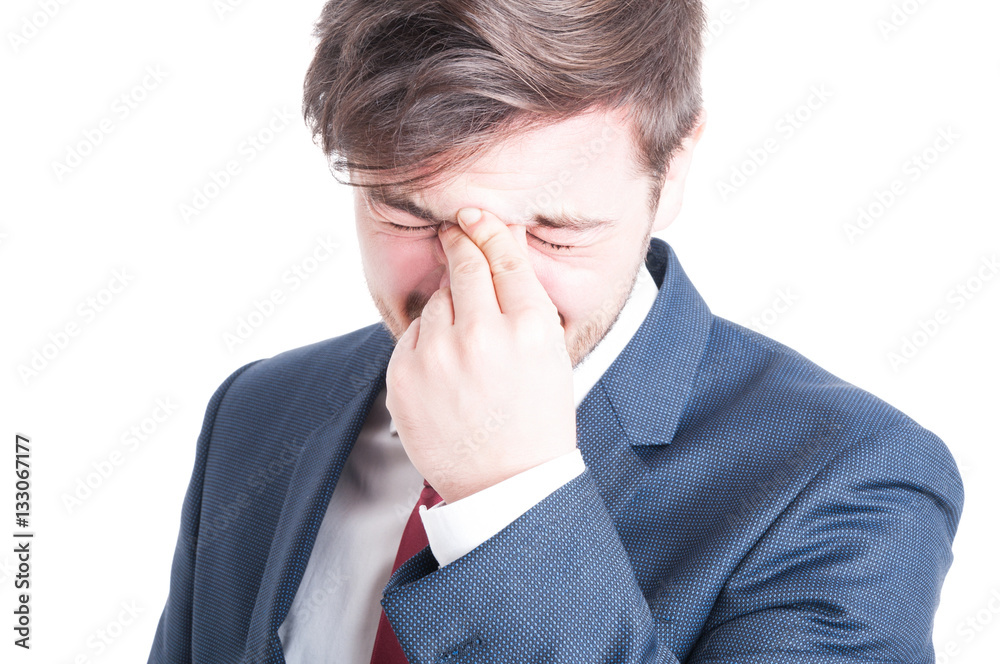 Close-up of business man having a head ache Close-up of business man having a head ache