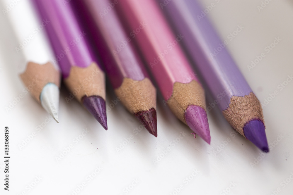 Colored pencils on white background. Colored pencils on white background.