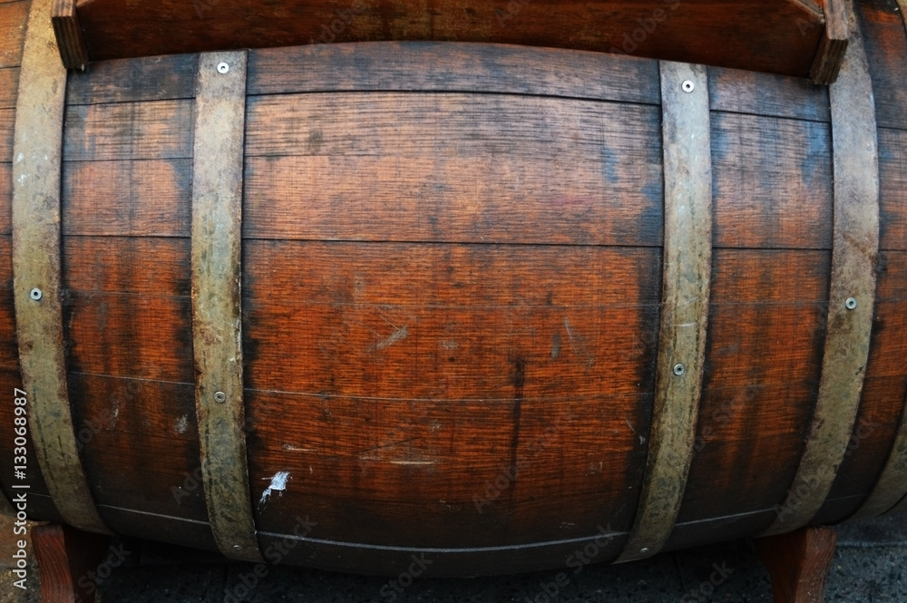 brown wooden wine barrel with metal rings brown wooden wine barrel with metal rings