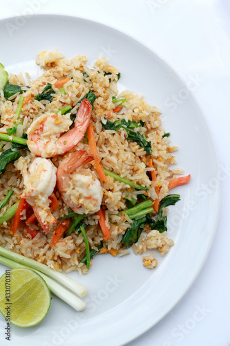Delicious Shrimp fried rice. Unique style in the white dish on white background, Thai food.
