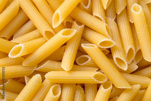 Penne pasta background.