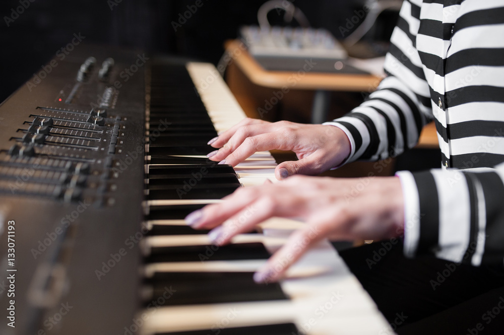 Fototapeta premium Hands music, synthesizer, piano