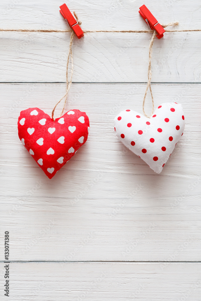 Valentine day background, pillow hearts couple on wood, copy space