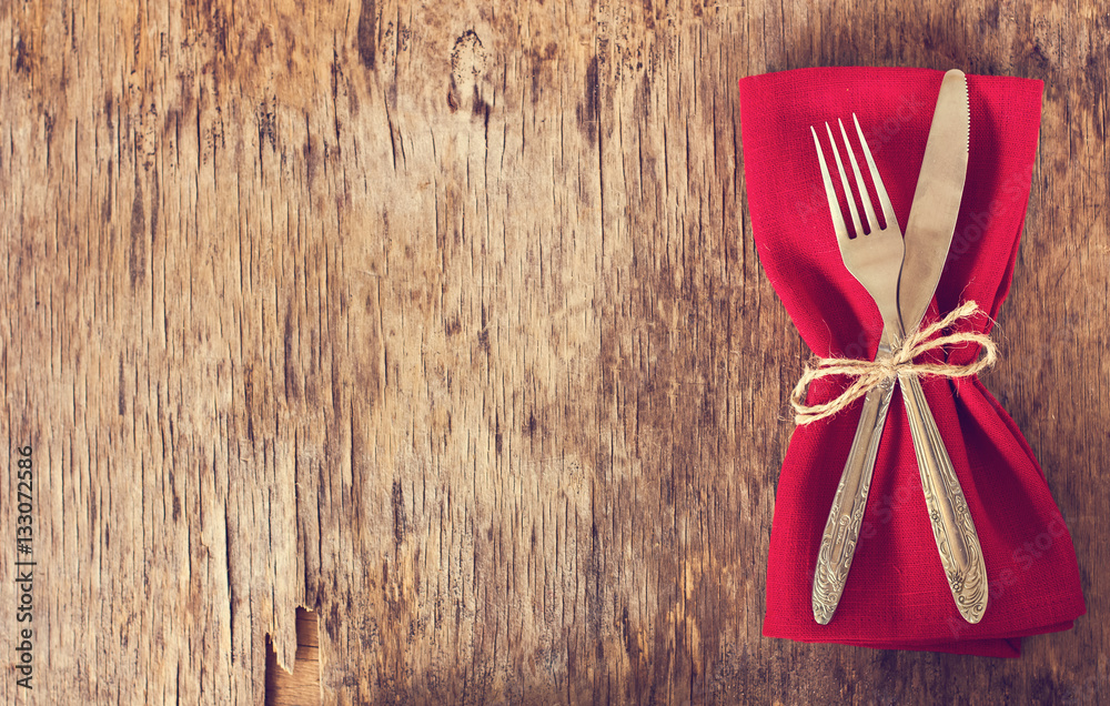 table set with red napkin. table set with red napkin.