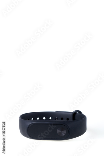 Black fitness tracker isolated on white background. Sports bracelet.