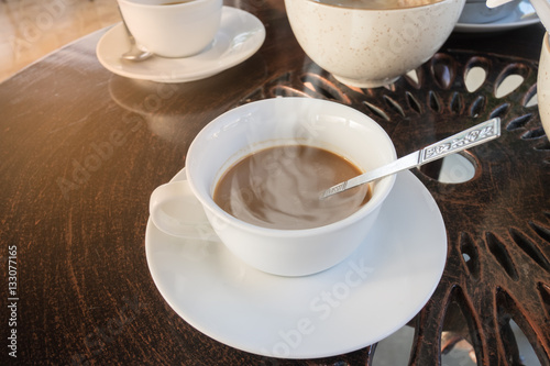 Hot coffee cup and breakfast on table in the morning