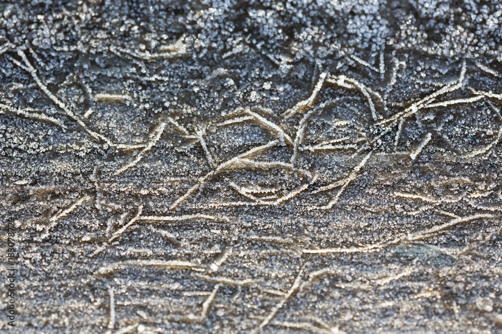 Frozen texture. Like worms. Crystal and abstract art from nature on a wooden surface.