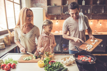 Young family cooking