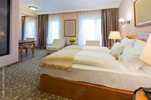 Interior of a new hotel double bed bedroom