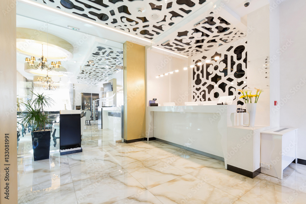 Fototapeta premium Reception area with reception desk in modern hotel