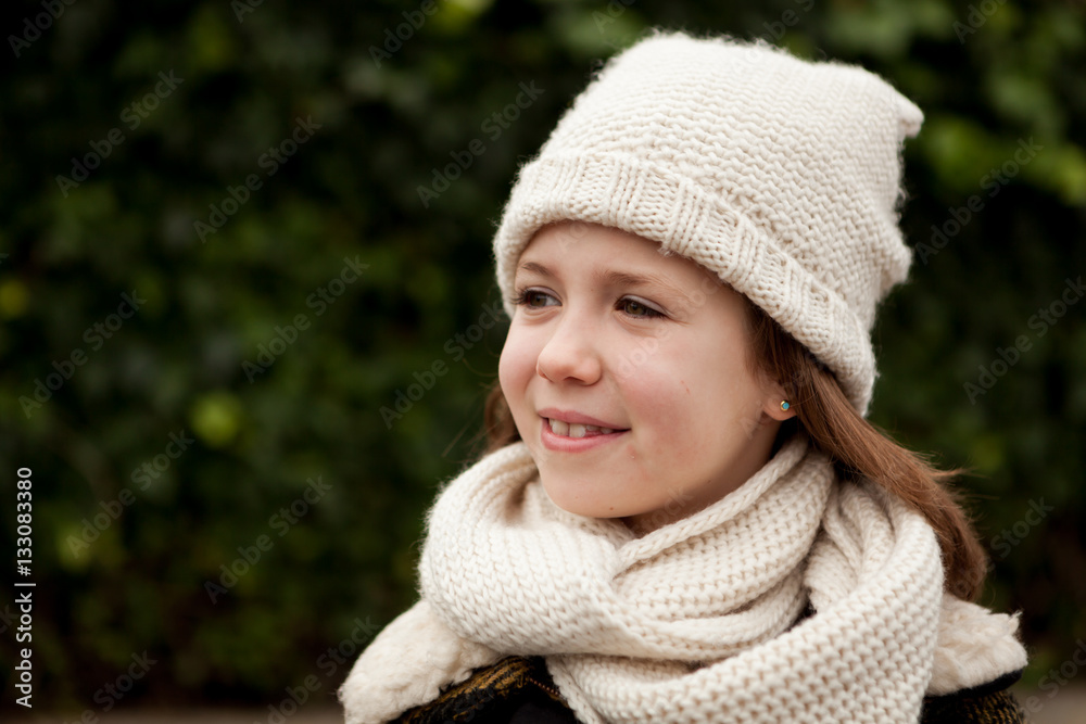 Pretty girl with wool hat in a park Pretty girl with wool hat in a park