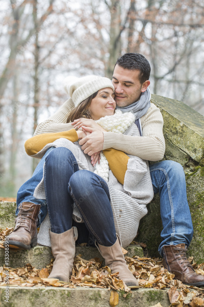 Fototapeta premium Young couple Walking Winter Woodland