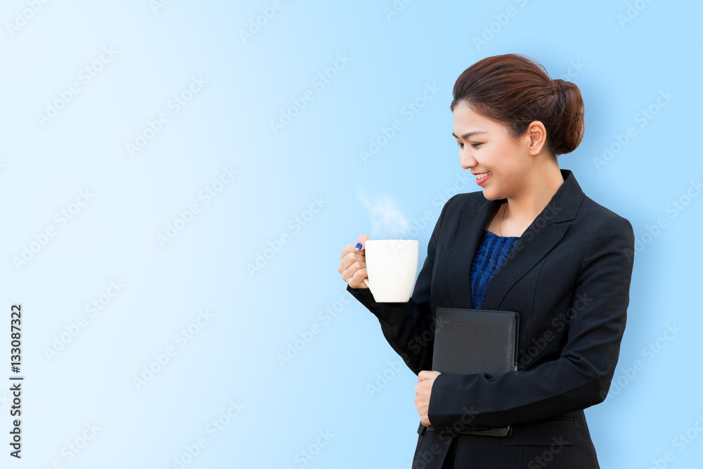 Business woman is holding white mug with copy space Business woman is holding white mug with copy space