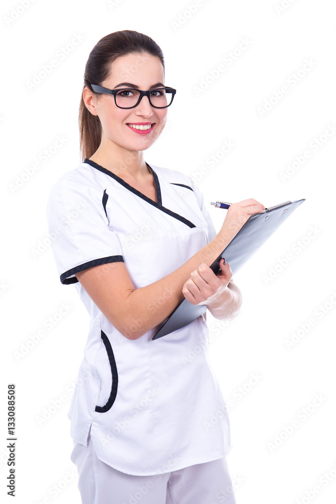 young beautiful woman doctor writing something on clipboard isol young beautiful woman doctor writing something on clipboard isol