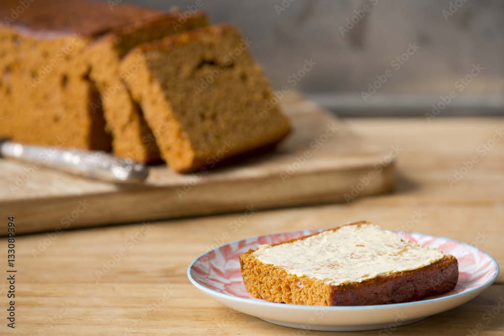 Traditional Dutch spice bread or 'ontbijtkoek' with butter
