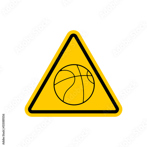 Attention basketball. Dangers yellow road sign. Game Ball Cautio photo