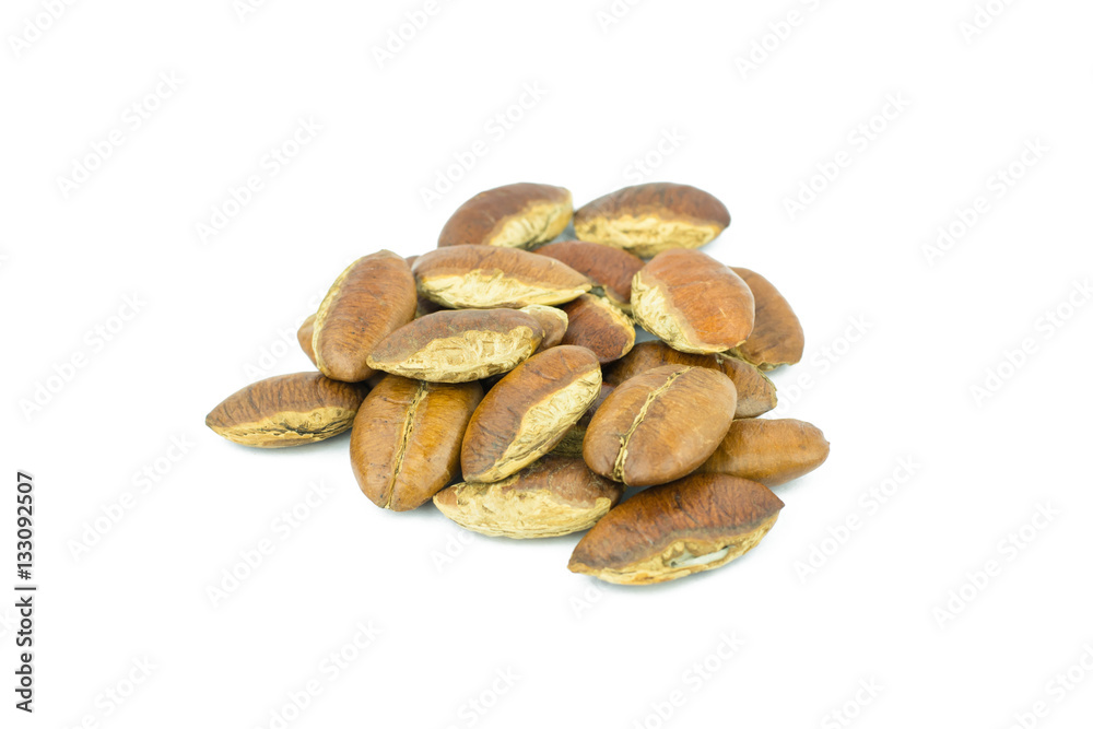 Obraz premium Roasted kayu seeds on white background (Irvingia malayana benn)