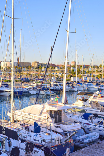 Boats at the Pier in Barcelona, Spain. Warm Sunset