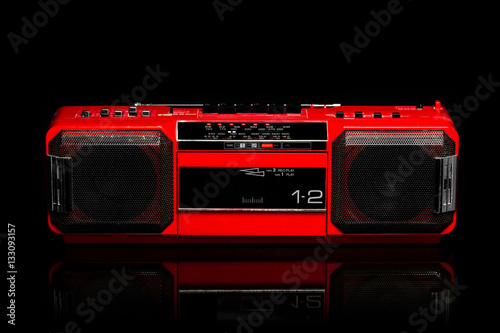 Obraz na płótnie Retro red boom box on black background