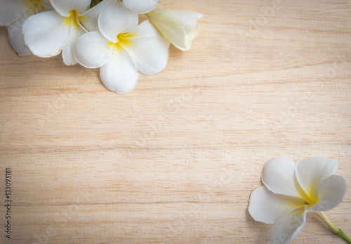 frangipani flower on a wooden background..