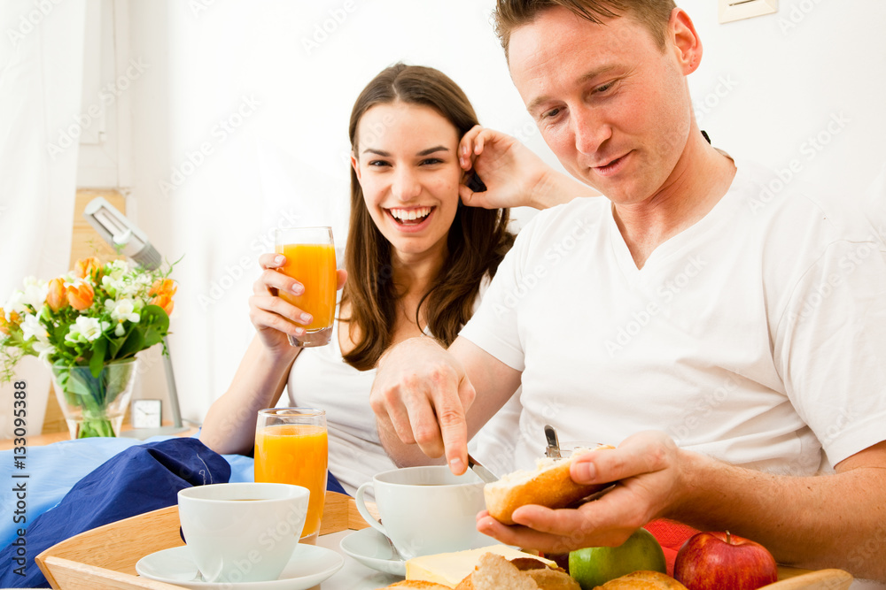 Couple Having Breakfast In Bed Couple Having Breakfast In Bed