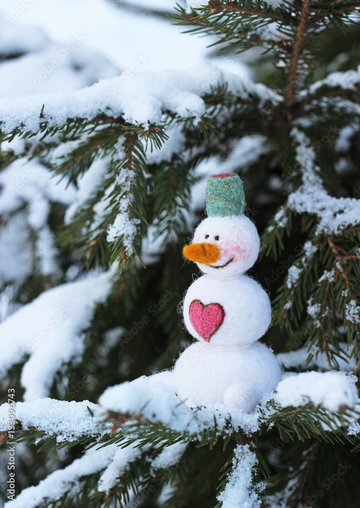 Obraz premium toy snowman, winter background