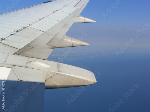 Canvas Print Grungy old plane wing on horizon