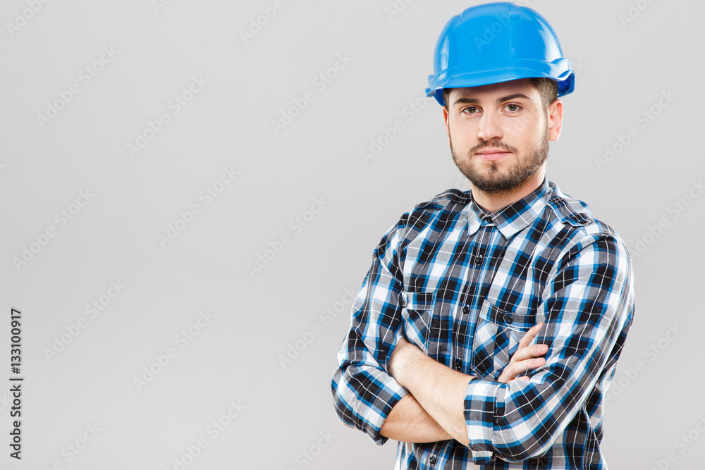 Man in blue building helmet Man in blue building helmet