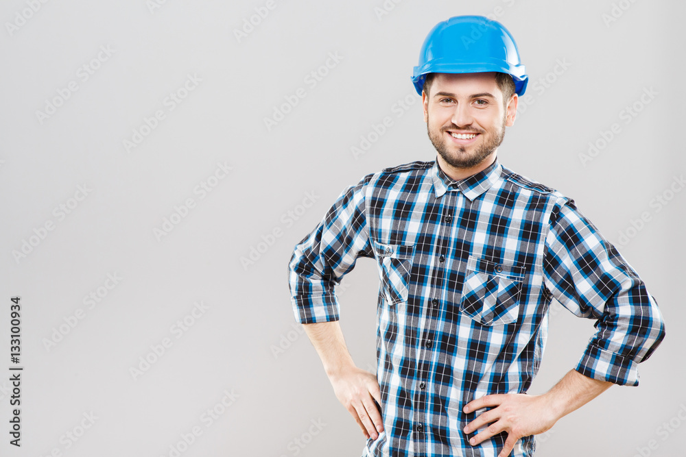 Builder in blue building helmet