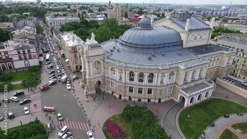 Odessa Opera House in Ukraine.Aerial camera flies towards the Odessa Opera House in Ukraine. Aerial footage of birds flying past the Odessa Opera house in Ukraine photo