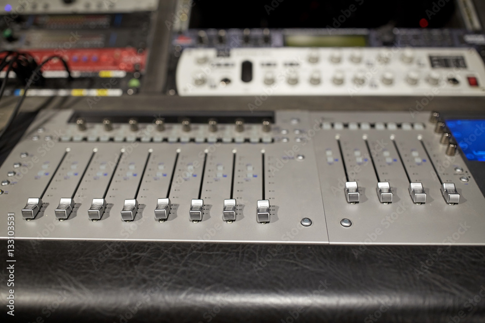 music mixing console at sound recording studio
