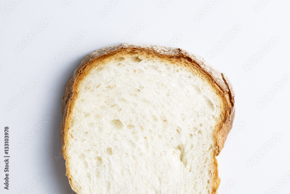 Fresh sliced white bread in close-up shot isolated on white background