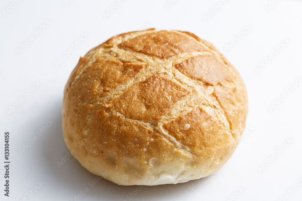 Fresh sliced white bread in close-up shot isolated on white background